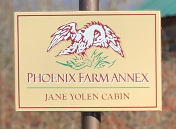Sign with text: Phoenix Farm Annex/Jane Yolen Cabin