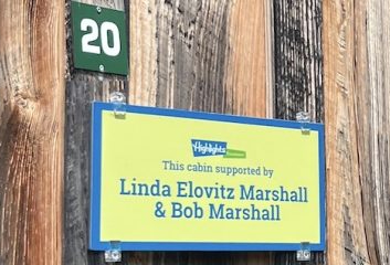 Sign on the Linda Elovitz Marshall & Bob Marshall Cabin 20 at Boyds Mills