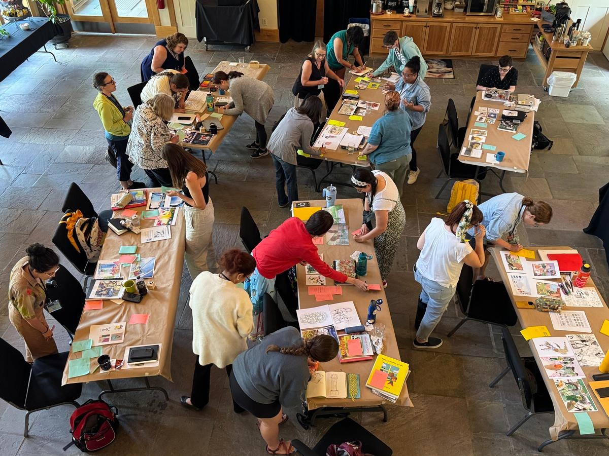 Photo of Summer Camp attendees working in the Barn