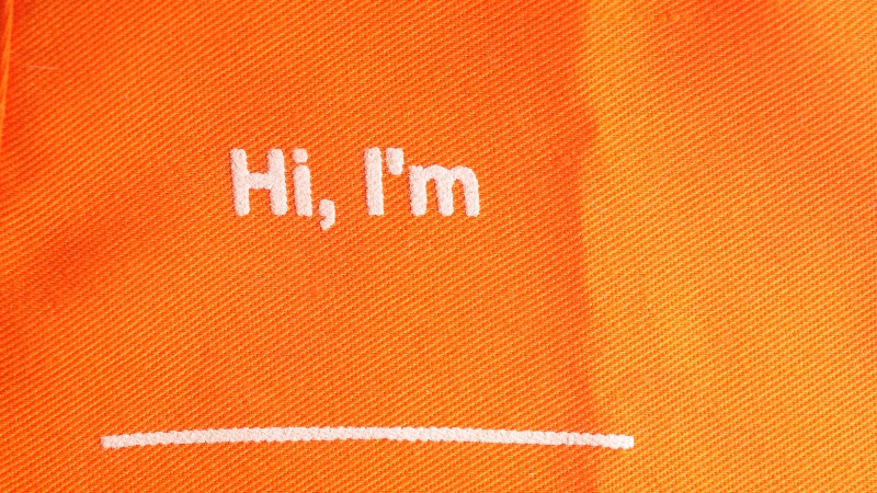 Name tag that says Hi, I'm [blank] for a character profile writing course
