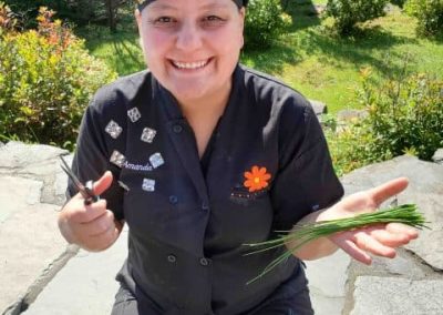 CHEF AMANDA WITH HERBS FROM OUR GARDEN