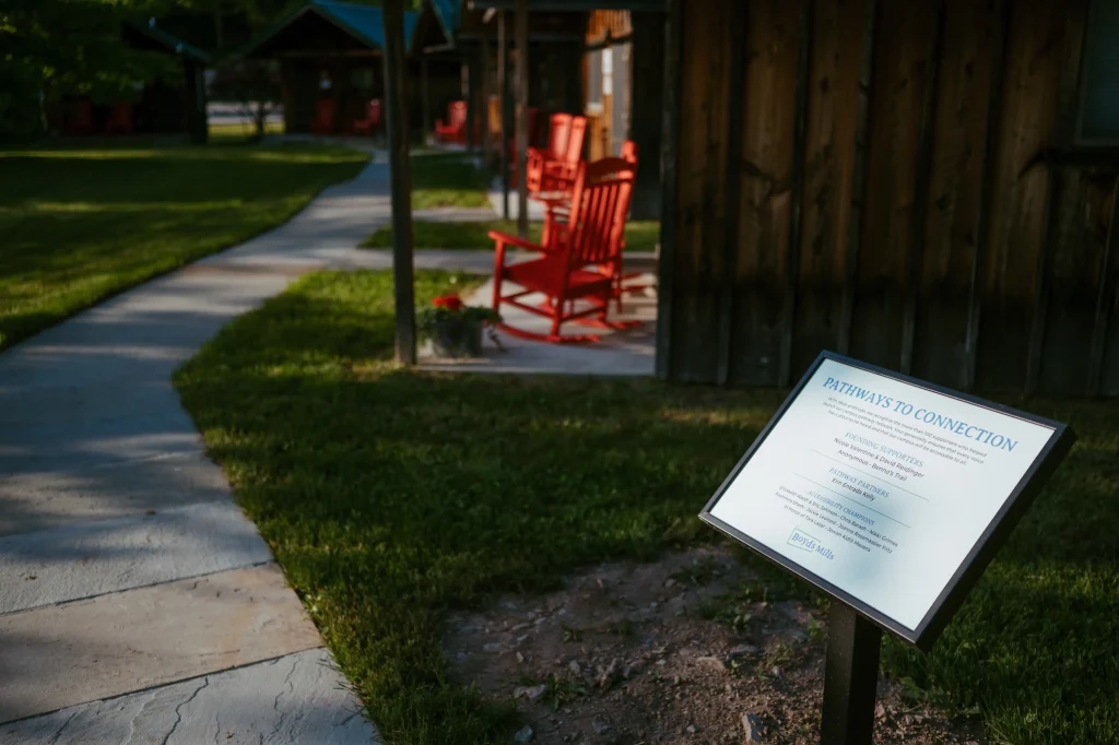 photo of pathway at boyds mills with donor recognition sign