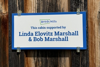 Sign on the Linda Elovitz Marshall & Bob Marshall Cabin 20 at Boyds Mills